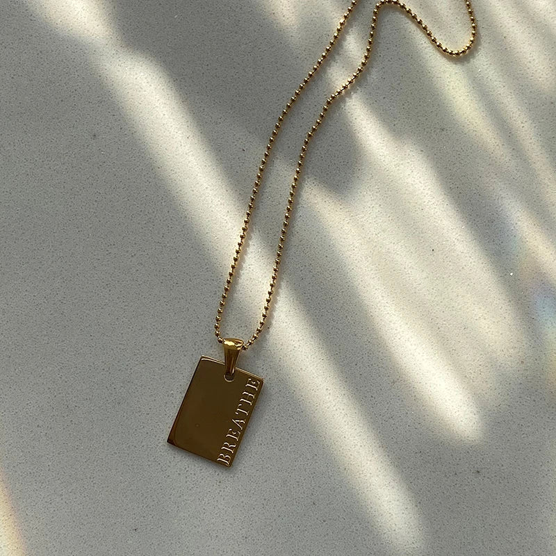 Elegant Gold Engraved Pendant Necklace